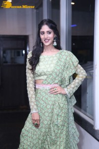 Actress Chandini Chowdary in a green dress