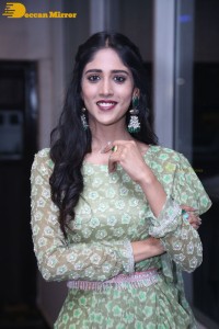 Actress Chandini Chowdary in a green dress