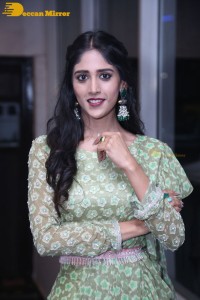 Actress Chandini Chowdary in a green dress