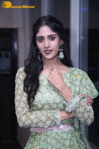 Actress Chandini Chowdary in a green dress