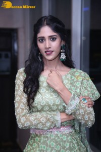 Actress Chandini Chowdary in a green dress