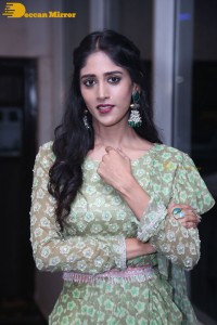 Actress Chandini Chowdary in a green dress