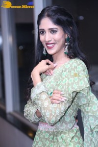Actress Chandini Chowdary in a green dress