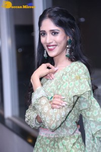 Actress Chandini Chowdary in a green dress
