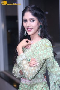 Actress Chandini Chowdary in a green dress