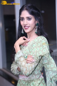 Actress Chandini Chowdary in a green dress