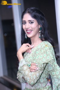 Actress Chandini Chowdary in a green dress