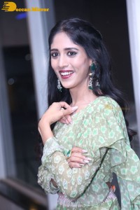 Actress Chandini Chowdary in a green dress