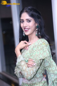 Actress Chandini Chowdary in a green dress