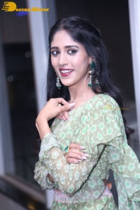 Actress Chandini Chowdary in a green dress