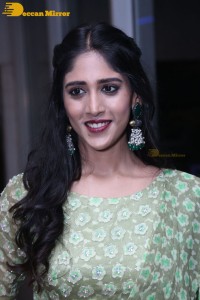 Actress Chandini Chowdary in a green dress