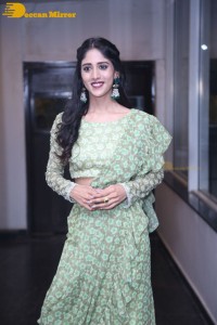 Actress Chandini Chowdary in a green dress