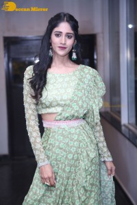 Actress Chandini Chowdary in a green dress