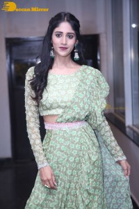 Actress Chandini Chowdary in a green dress