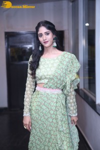 Actress Chandini Chowdary in a green dress