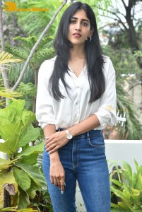Telugu Actress Chandini Chowdary in a white shirt and denim jeans