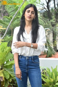 Telugu Actress Chandini Chowdary in a white shirt and denim jeans