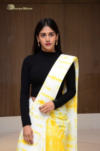 Telugu Actress Chandini Chowdary Photoshoot in a white and yellow half saree