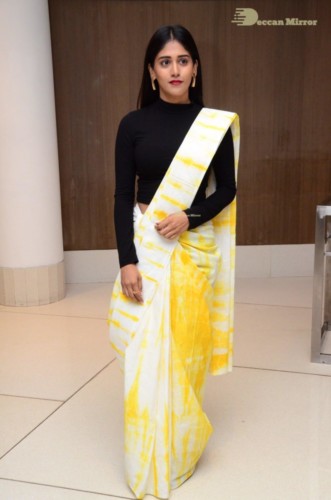 Telugu Actress Chandini Chowdary Photoshoot in a white and yellow half saree