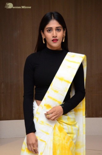Telugu Actress Chandini Chowdary Photoshoot in a white and yellow half saree