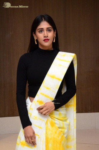 Telugu Actress Chandini Chowdary Photoshoot in a white and yellow half saree
