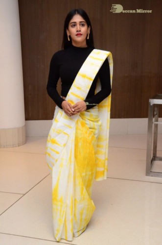 Telugu Actress Chandini Chowdary Photoshoot in a white and yellow half saree