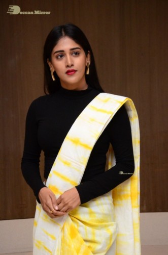 Telugu Actress Chandini Chowdary Photoshoot in a white and yellow half saree