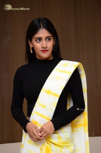 Telugu Actress Chandini Chowdary Photoshoot in a white and yellow half saree