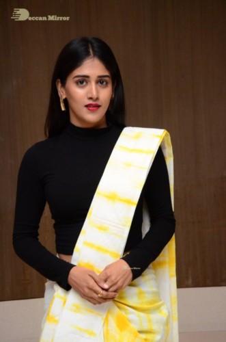 Telugu Actress Chandini Chowdary Photoshoot in a white and yellow half saree