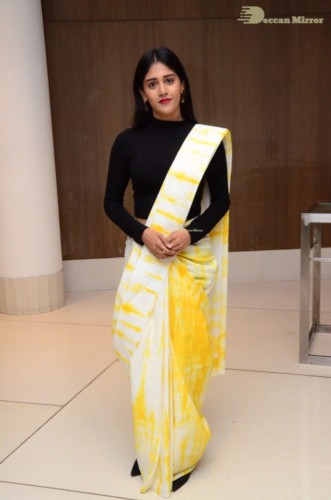 Telugu Actress Chandini Chowdary Photoshoot in a white and yellow half saree
