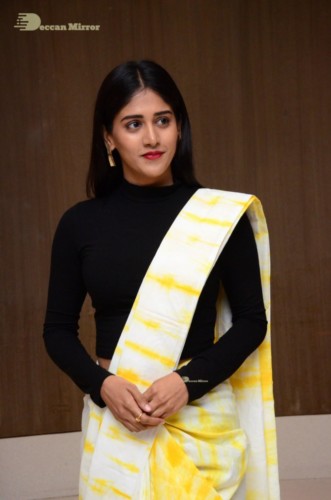 Telugu Actress Chandini Chowdary Photoshoot in a white and yellow half saree