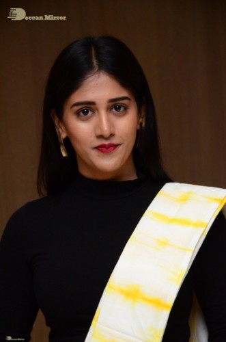 Telugu Actress Chandini Chowdary Photoshoot in a white and yellow half saree