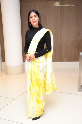 Telugu Actress Chandini Chowdary Photoshoot in a white and yellow half saree