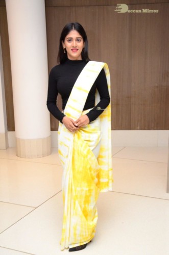 Telugu Actress Chandini Chowdary Photoshoot in a white and yellow half saree