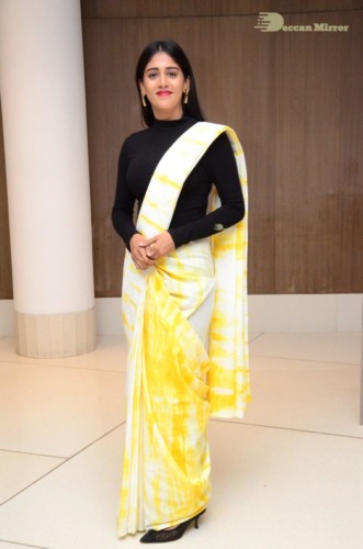 Telugu Actress Chandini Chowdary Photoshoot in a white and yellow half saree