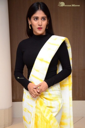 Telugu Actress Chandini Chowdary Photoshoot in a white and yellow half saree