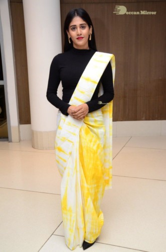 Telugu Actress Chandini Chowdary Photoshoot in a white and yellow half saree
