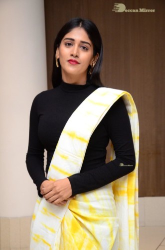 Telugu Actress Chandini Chowdary Photoshoot in a white and yellow half saree