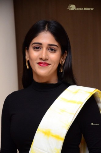 Telugu Actress Chandini Chowdary Photoshoot in a white and yellow half saree