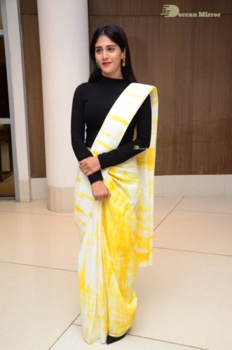 Telugu Actress Chandini Chowdary Photoshoot in a white and yellow half saree
