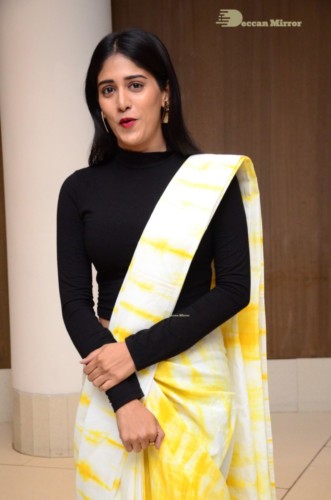 Telugu Actress Chandini Chowdary Photoshoot in a white and yellow half saree
