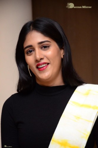 Telugu Actress Chandini Chowdary Photoshoot in a white and yellow half saree