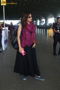 Indian actress Chitrangada Singh fashionable in a sleeveless dress