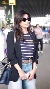 actress Chitrangada Singh cute in a striped t-shirt and jacket