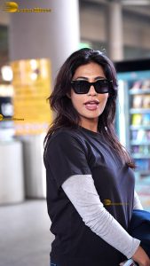 actress Chitrangada Singh pretty in t-shirt and sunglasses at airport