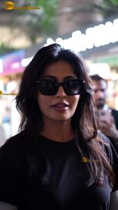 actress Chitrangada Singh pretty in t-shirt and sunglasses at airport