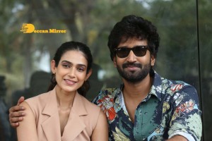 Akanksha Singh and Aadhi Pinisetty pose for pictures during the press meet of the movie Clap