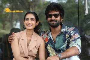 Akanksha Singh and Aadhi Pinisetty pose for pictures during the press meet of the movie Clap