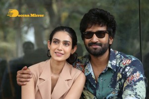 Akanksha Singh and Aadhi Pinisetty pose for pictures during the press meet of the movie Clap
