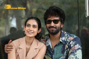 Akanksha Singh and Aadhi Pinisetty pose for pictures during the press meet of the movie Clap